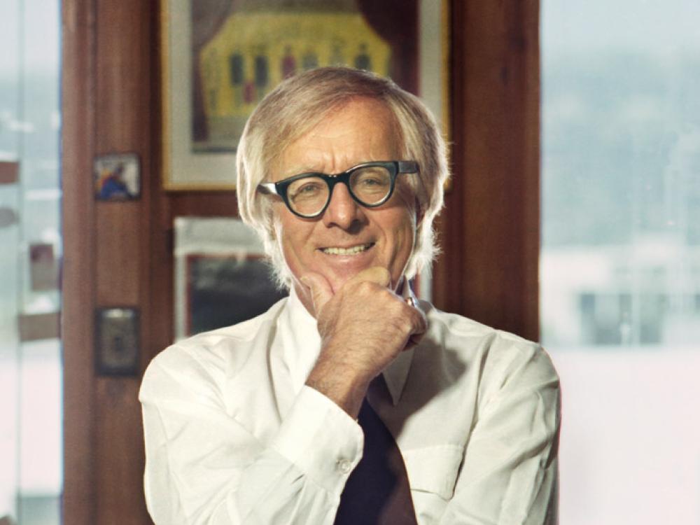man in front of desk