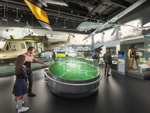 A rendering of a museum gallery that features modern military aviation technology such as drones and helicopters.