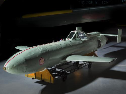 Single-seat, all-metal monocoque construction with a conventional layout, twin wings, and twin vertical fins and rudders.